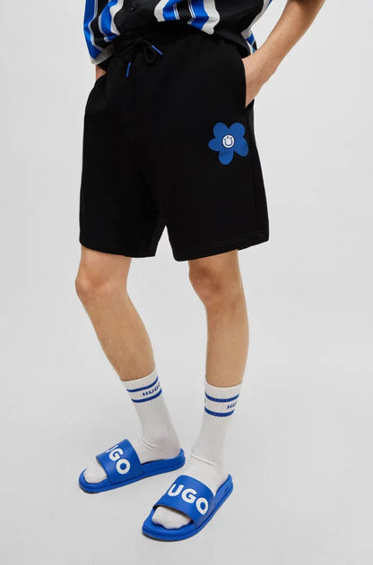 HUGO COTTON-TERRY SHORTS WITH FLORAL LOGO ARTWORK