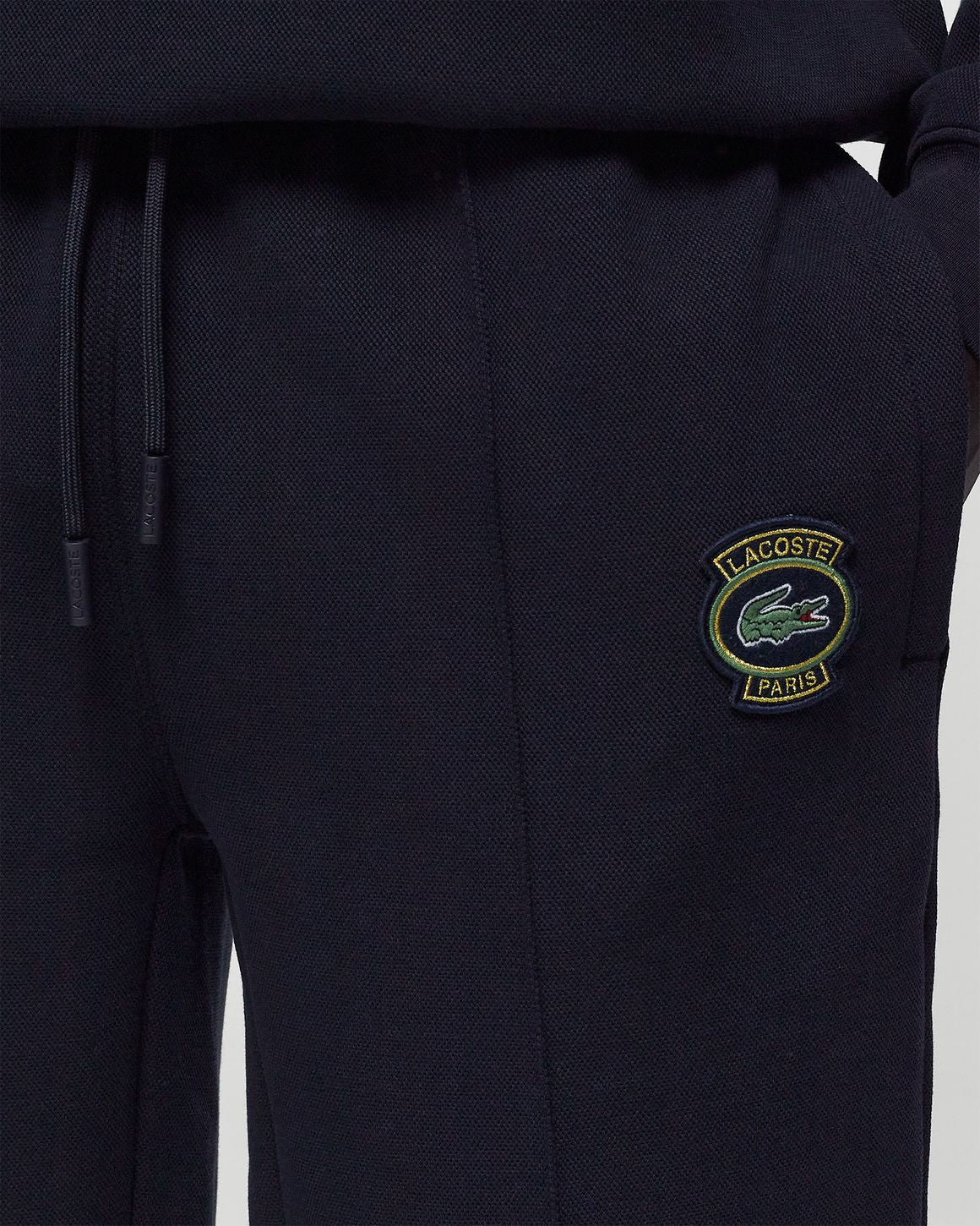 Lacoste logo-patch piqué-weave trousers